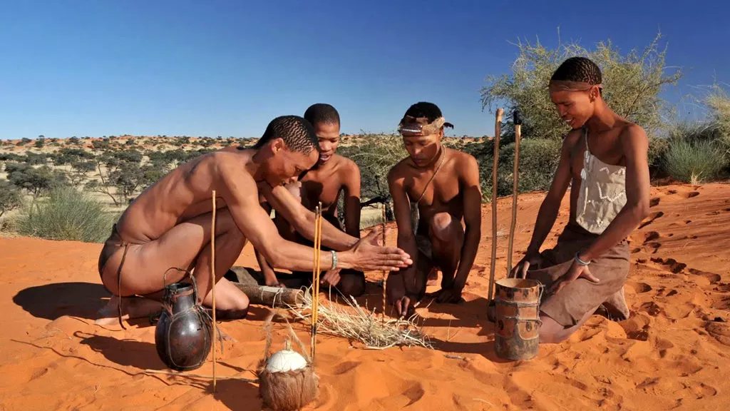San Bushmen in Namibia making a fire
