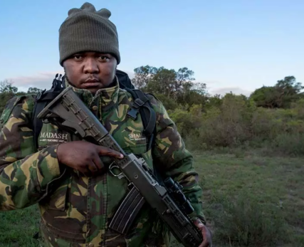 02_An-anti-poaching-ranger-poses-with-his-firearm-at-Shamwari-Private-Game-Reserve