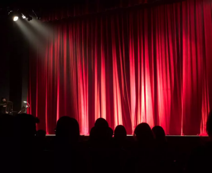theatre-stage-stock-photo-with-audience-silhouetted-1